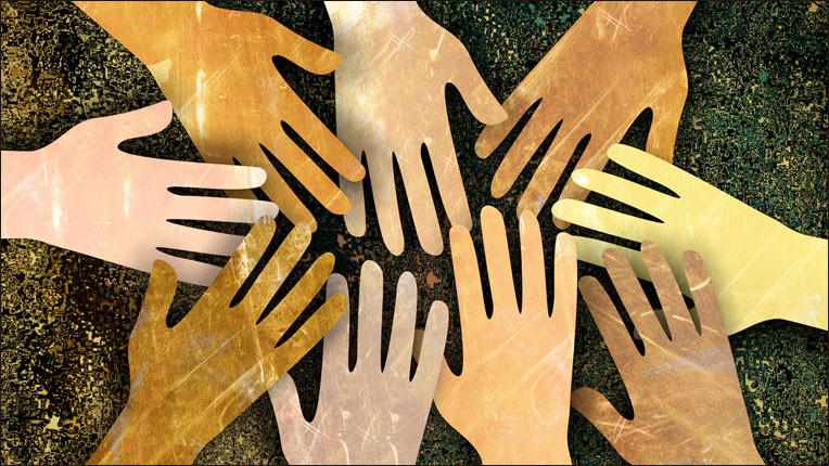 Image of different skin tone hands in a high-five circle